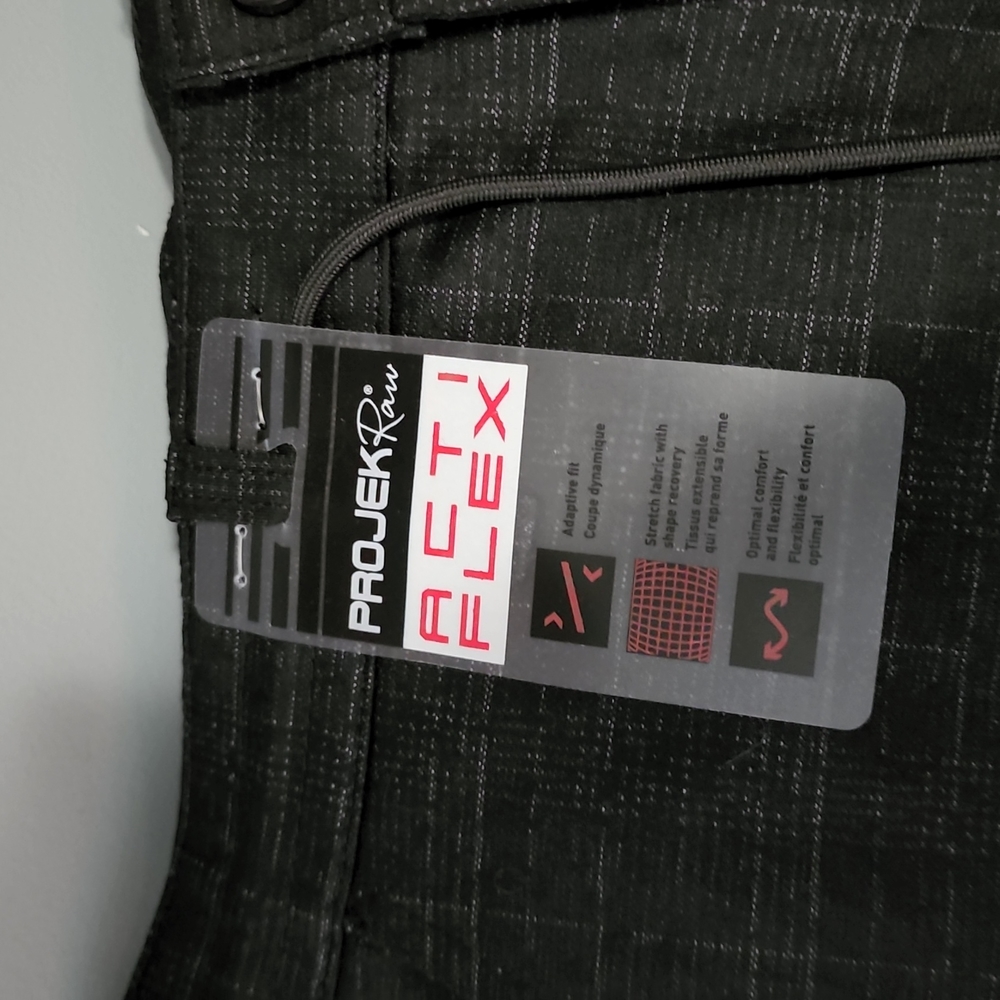 Black plaid active flex pants. Dress up or down .slim fit and flex. 34-32